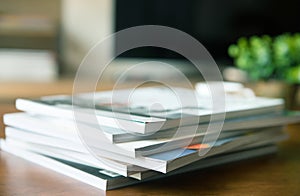 selective focus of stacking magazine place on table in living