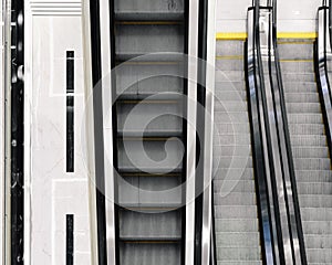 Selective focus on the stairs of an electric escalator.