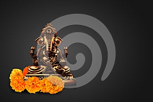 Selective focus on statue of Lord Ganesha , Ganesha Festival. Hindu religion and Indian celebration of Diwali festival concept on