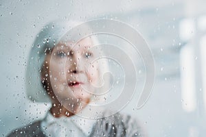 selective focus of thoughtful senior woman