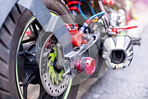 Selective focus to brightly colored motorcycle accessories