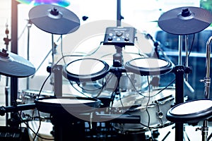 Selective focus to electronic cymbals of electronic drum set in music room