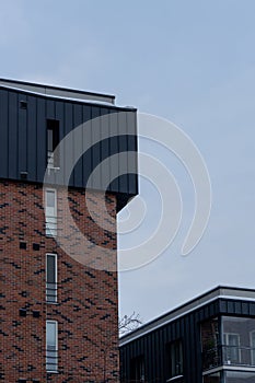 Selective focus to modern new apartments building at Pille street during winter time. Uus-Veereni, Tallinn, Estonia