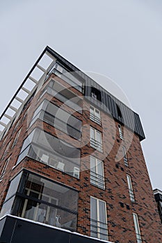 Selective focus to modern new apartments building at Pille street during winter time. Uus-Veereni, Tallinn, Estonia