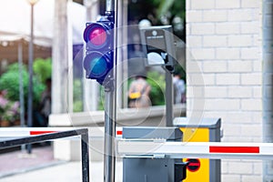 Selective focus to signal light of automatic barrier gate system. Parking and automatic payment system with licence plate