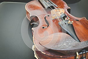 Selective focus of  Violin on musician chair