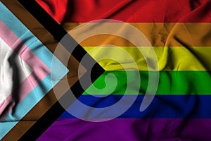 selective focus on the wavy satin LGBTQ progress flag