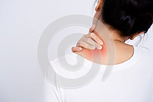 Selective focus woman with neck pain. Acute pain in a female. Health care concept