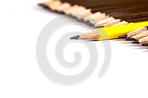Selective focus of wooden pencil arrange with one different