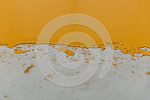 Selective focus on the yellow floor of freshly applied epoxy mortar system