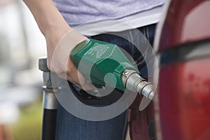 Selective Focus Of A Young Man Refueling His Car