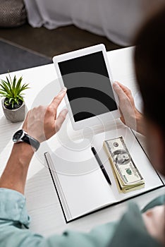 Selective focus of young man using