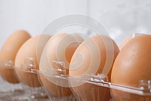 Selective focused chicken eggs in a plastic tray