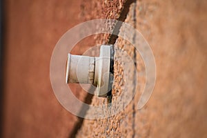 Selective focused view of old bulb holder on the wall