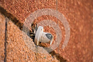 Selective focused view of old bulb holder on the wall