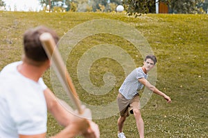 Selective of teenager boy throwing ball