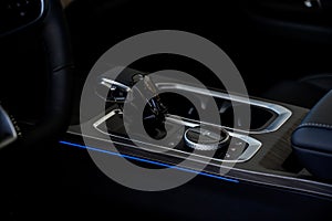 Automatic transmission selector in the interior of a modern car