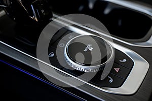 Automatic transmission selector in the interior of a modern car