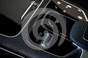 Automatic transmission selector in the interior of a modern car