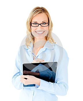 Self-assured businesswoman holding clipboard photo