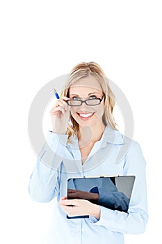 Self-assured businesswoman holding a clipboard