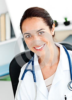 Self-assured female doctor smiling at the camera photo