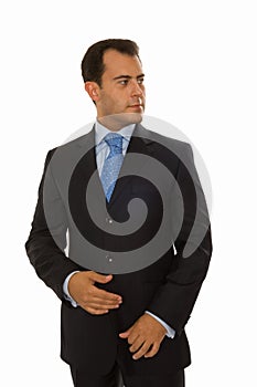 Self-assured young businessman looking to the left photo