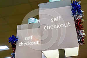 Self Checkout sign in a store