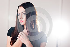 Self confident woman in black dress