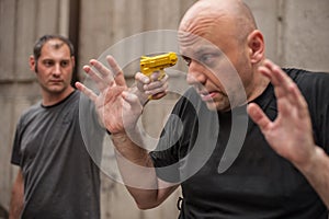 Self defense techniques against a gun