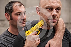 Self defense techniques against a gun