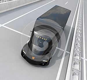 Self-driving electric semi truck driving on highway