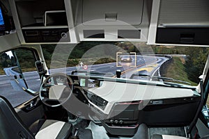 Self driving truck with head up display on a road.