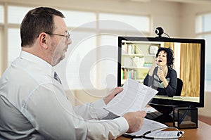 Self-employed doctor watching how virtual patient takes a pill