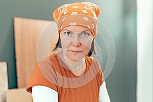 Self employed female carpenter looking at camera portrait