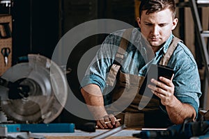 Self-employed machine constructor calculating costs photo