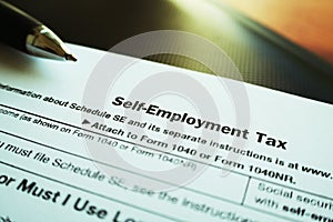 Self Employment Tax Form With Lomo Effect Close Up With Pen High Quality