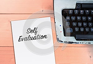 Self evaluation on paper with typewriter