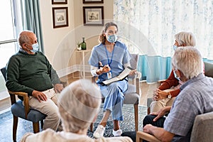 Self help therapy group meeting in nursing home during covid photo