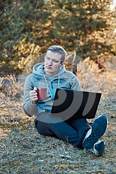 Self isolation, distractions at home concept. Unplugging after work, working too much concept. Men outside on nature