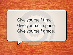 Self love and care motivational words - Give yourself time, give yourself space and grace. With advice sign on orange background.