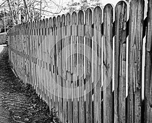 Self made fence from wooden slats