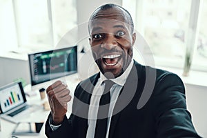 Self portrait of happy young African man