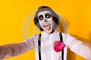 Self-portrait of his he nice handsome spooky baleful cheerful cheery foolish guy catrina celebratory having fun showing