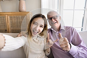 Self portrait of teenager granddaughter kid and older grandpa