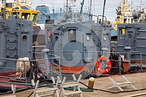 Self-propelled steel diesel oil skimmer vessels.