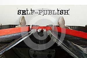 Self-publish text typed on retro typewriter. Business and self publish concept