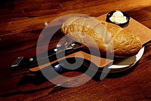 Self Serve Bread and Butter on Cutting Board