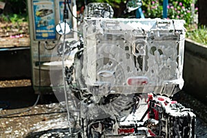 Self-Service Washing, Touring Motorcycle Cleaner with Foam Spray in the Outdoor Self car wash Garage