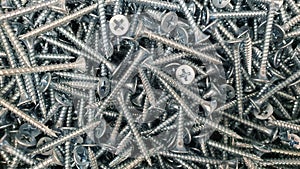 self-tapping screw for installation of metal roofing and other construction works, self-tapping screw, as a background